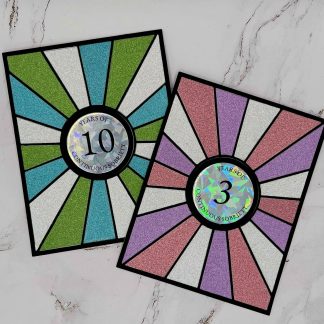 Two Celebrate Continuous Sobriety recovery cards with colorful, glittery designs for sobriety milestones.