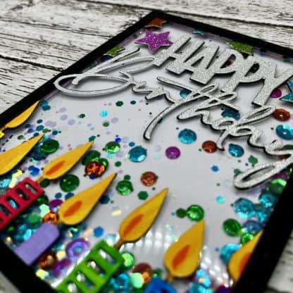 Vibrant handmade recovery card with glitter, candles, and celebratory elements for recovery milestones.