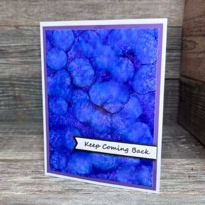 Blue watercolor handmade recovery card with 'keep coming back' slogan.