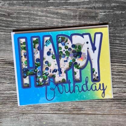 Birthday shaker card with confetti and cheerful design.