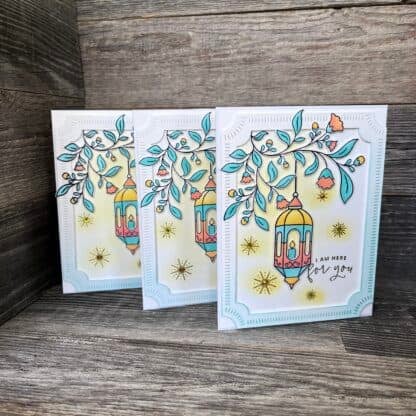 Colorful handmade recovery cards with lantern and floral design for sobriety.